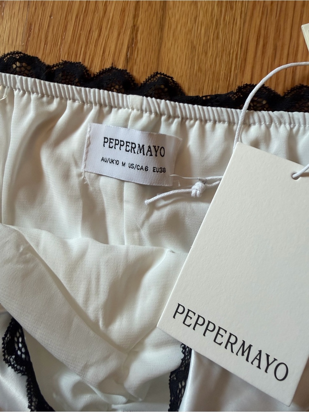 Peppermayo White Strapless Mini Dress with Black Ribbon Trim - Picture 3 of 3